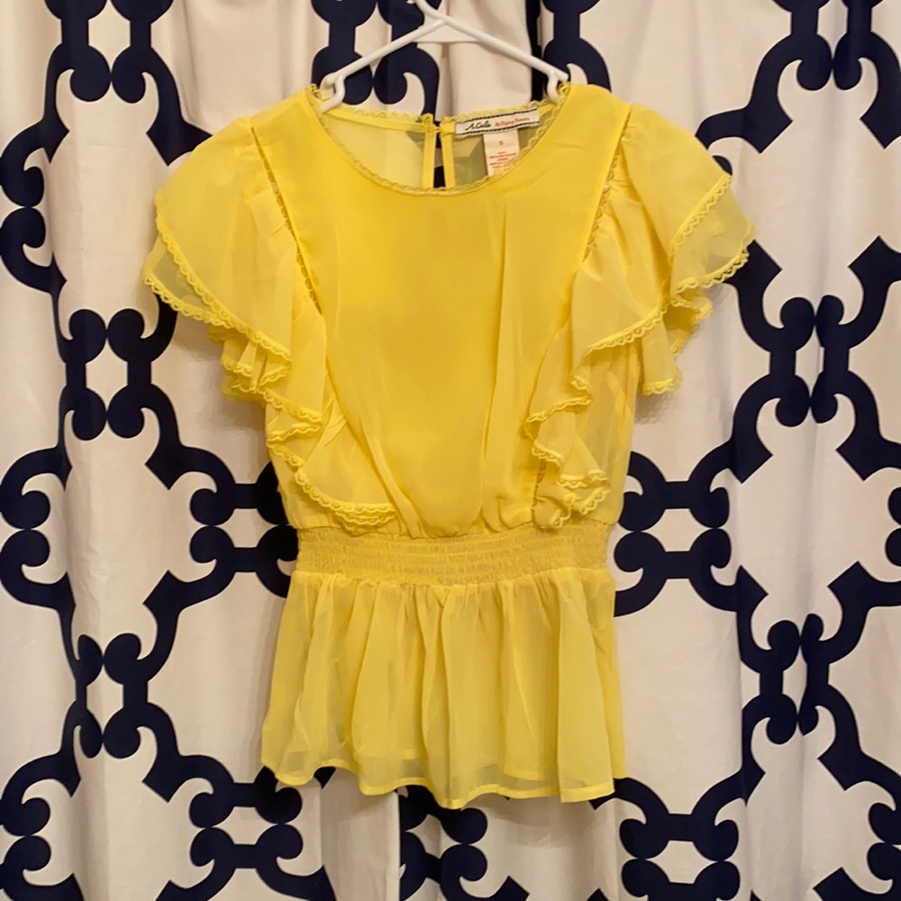 Yellow peplum top